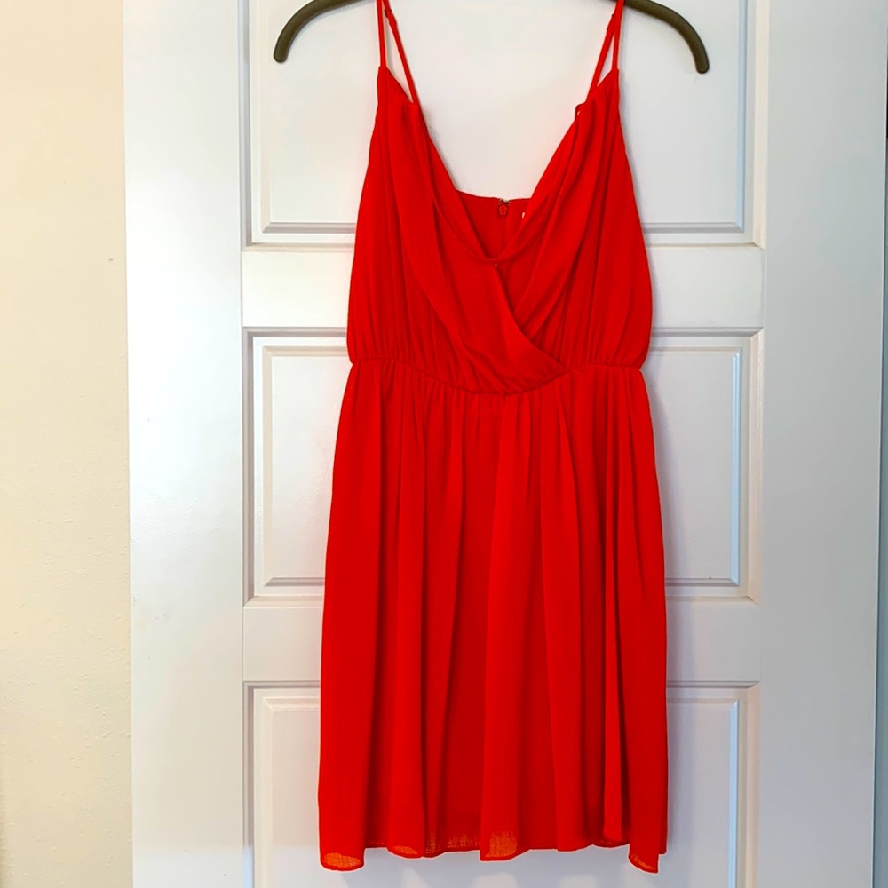 Rebecca Minkoff Coral color dress. It’s flowy, light yet lined & comfy too!